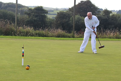 Richard Cousins(LYM) trying to hit Tony Jennings(CWLL) black ball away from the peg