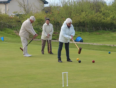 Ron George coaching 2 visitors