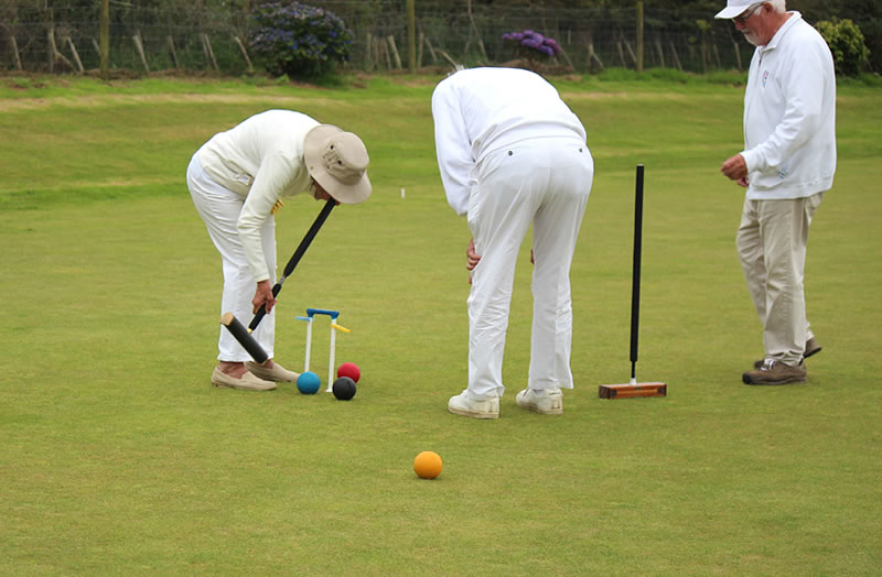 Margaret Read with Referee (Ron George) monitoring a tricky shot