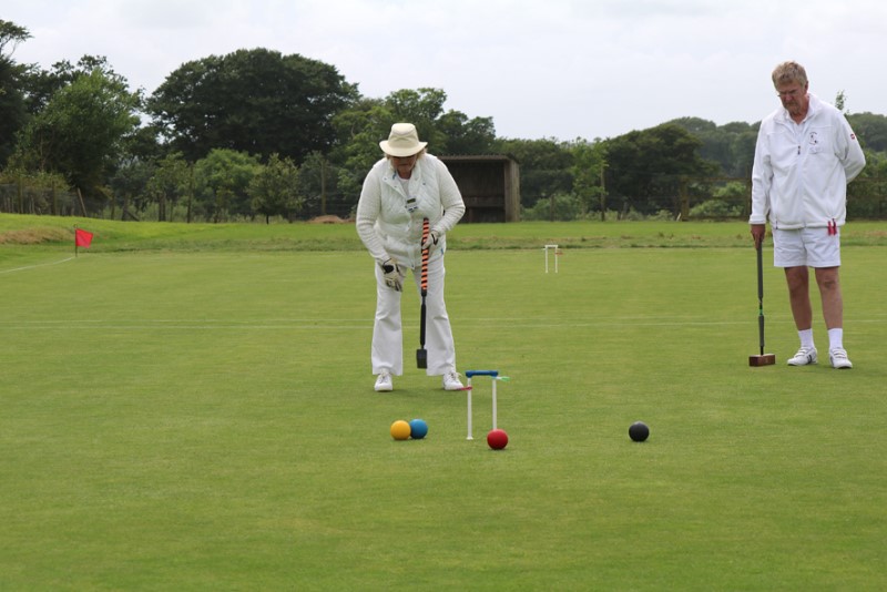 Afternoon singles, Tanis Boxall (CR) red through hoop 8